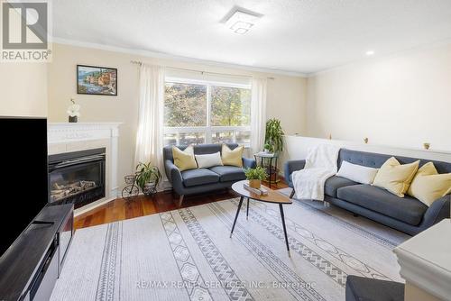 140 - 1915 Denmar Road E, Pickering, ON - Indoor Photo Showing Living Room With Fireplace