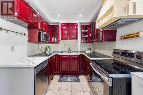 140 - 1915 Denmar Road E, Pickering, ON - Indoor Photo Showing Kitchen With Double Sink