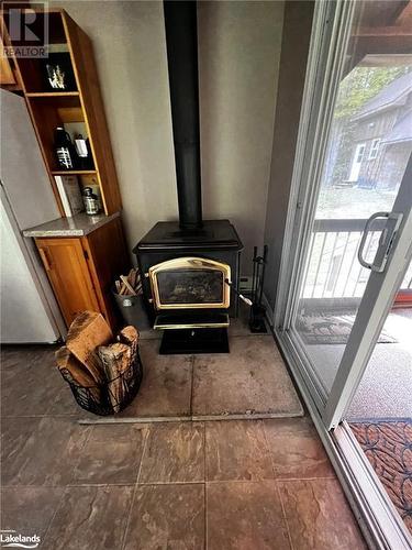 WETT compliant Woodstove - 1571 Buckslide Road, Algonquin Highlands, ON - Indoor Photo Showing Other Room