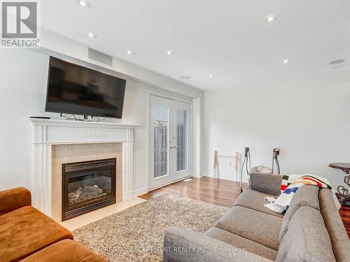 56 Geranium Avenue, Hamilton, ON - Indoor Photo Showing Living Room With Fireplace