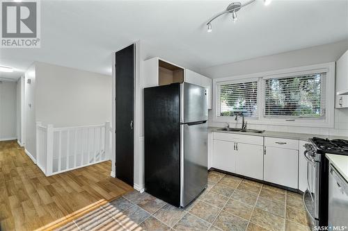 828 Shannon Road, Regina, SK - Indoor Photo Showing Kitchen With Double Sink