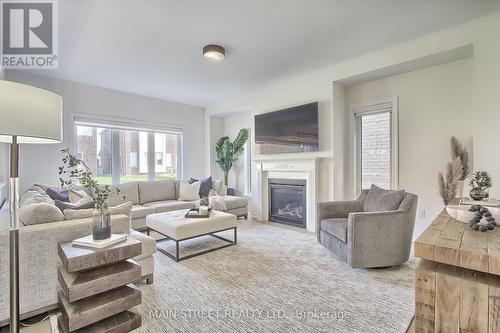 22 Kenneth Ross Bend, East Gwillimbury, ON - Indoor Photo Showing Living Room With Fireplace