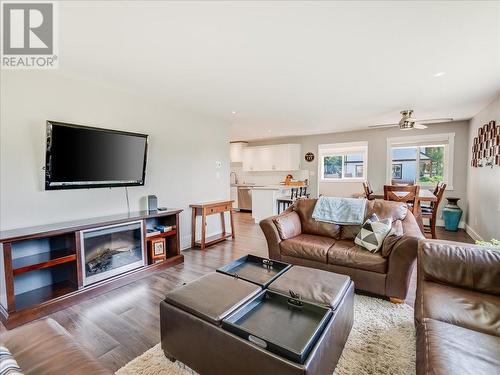 10 Skands Road, Christina Lake, BC - Indoor Photo Showing Living Room With Fireplace