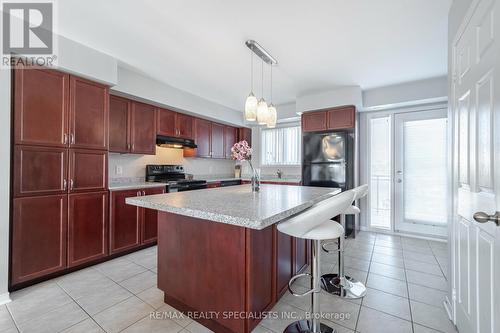 1 - 5005 Oscar Peterson Boulevard, Mississauga, ON - Indoor Photo Showing Kitchen With Upgraded Kitchen