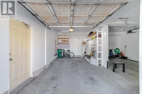 1 - 5005 Oscar Peterson Boulevard, Mississauga, ON - Indoor Photo Showing Garage