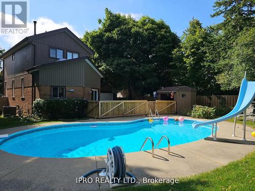 7027 Estoril Road, Mississauga, ON - Outdoor With In Ground Pool With Backyard