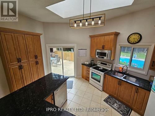 7027 Estoril Road, Mississauga, ON - Indoor Photo Showing Kitchen With Double Sink