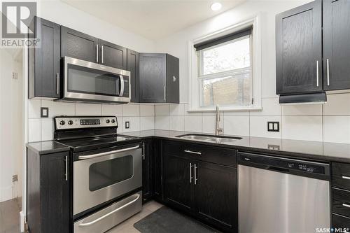 104 Idylwyld Place, Saskatoon, SK - Indoor Photo Showing Kitchen With Double Sink