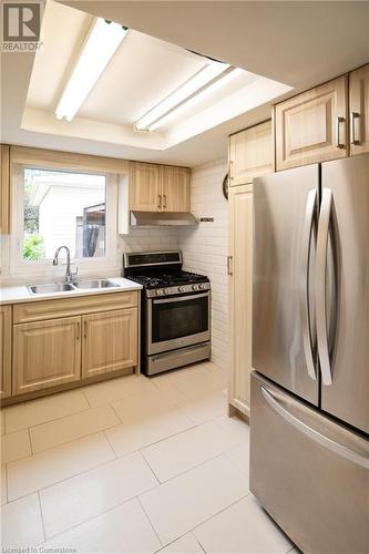 25 Windward Street, St. Catharines, ON - Indoor Photo Showing Kitchen With Double Sink