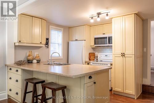 119 Glenforest Road, Toronto, ON - Indoor Photo Showing Kitchen With Double Sink