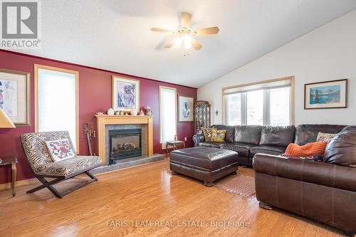 2 St James Place, Wasaga Beach, ON - Indoor Photo Showing Living Room With Fireplace