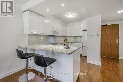 502 - 40 Sylvan Valleyway, Toronto, ON - Indoor Photo Showing Kitchen With Upgraded Kitchen