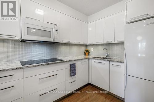 502 - 40 Sylvan Valleyway, Toronto, ON - Indoor Photo Showing Kitchen With Upgraded Kitchen