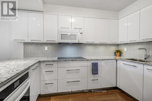 502 - 40 Sylvan Valleyway, Toronto, ON - Indoor Photo Showing Kitchen With Upgraded Kitchen