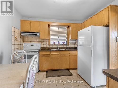 79 Cuffley Crescent S, Toronto, ON - Indoor Photo Showing Kitchen With Double Sink