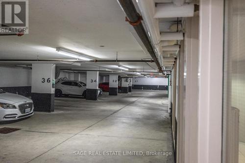 407 - 2 Edith Drive, Toronto, ON - Indoor Photo Showing Garage