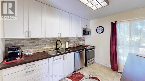 81 - 615 Rathburn Road E, Toronto, ON - Indoor Photo Showing Kitchen With Double Sink