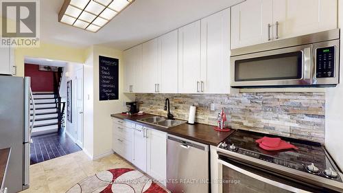 81 - 615 Rathburn Road E, Toronto, ON - Indoor Photo Showing Kitchen With Double Sink