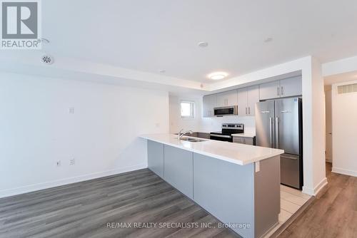 13 - 195 Veterans Drive, Brampton, ON - Indoor Photo Showing Kitchen With Double Sink