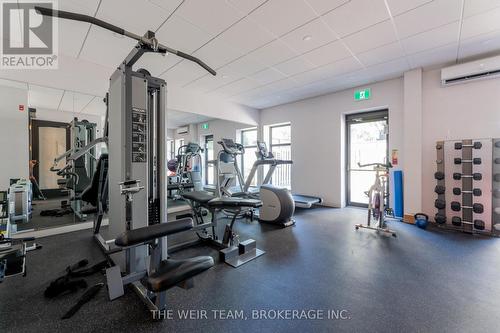 305 - 1 Deer Park Crescent, Toronto, ON - Indoor Photo Showing Gym Room