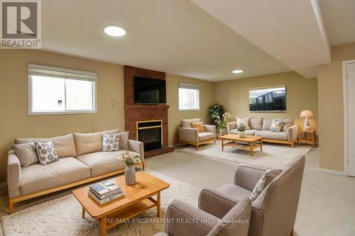 15 Broughton Avenue, Hamilton, ON - Indoor Photo Showing Living Room With Fireplace