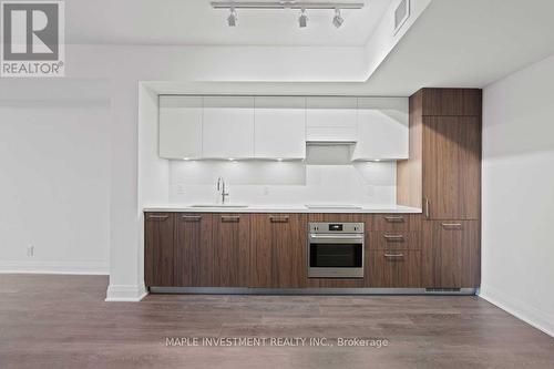 326 - 33 Frederick Todd Way, Toronto, ON - Indoor Photo Showing Kitchen