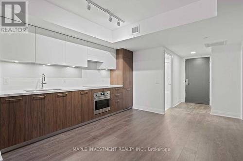 326 - 33 Frederick Todd Way, Toronto, ON - Indoor Photo Showing Kitchen