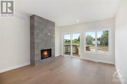 *Interior images are of mirror image unit next door by builder, not home for sale - NO FIREPLACE IN UNIT FOR SALE* - 