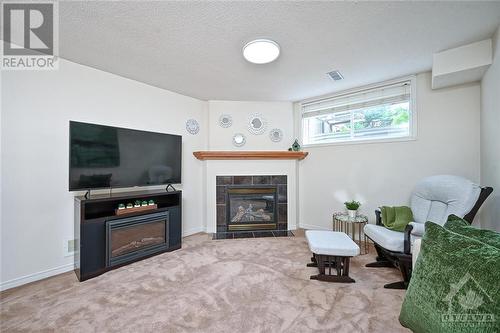 164 Deercroft Avenue, Ottawa, ON - Indoor Photo Showing Living Room With Fireplace