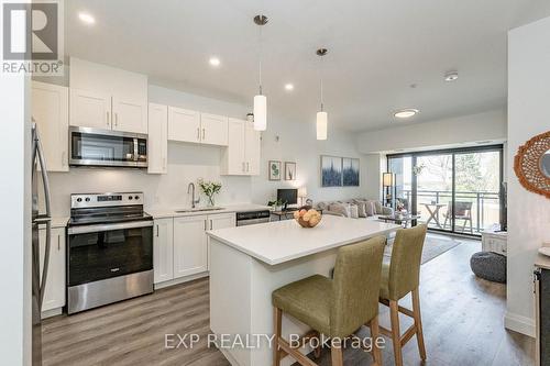 203 - 332 Gosling Gardens, Guelph, ON - Indoor Photo Showing Kitchen With Upgraded Kitchen