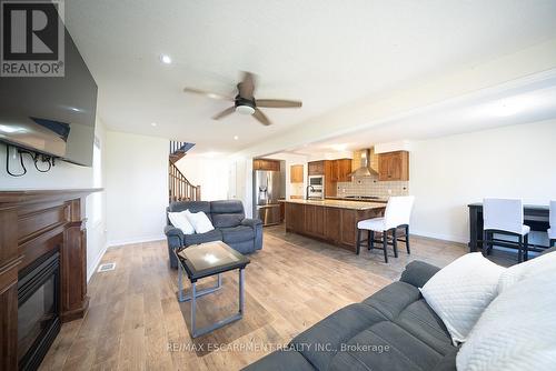 8 Oakes Court, Guelph, ON - Indoor Photo Showing Living Room With Fireplace