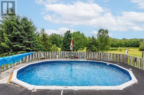 401 Cordova Road, Marmora And Lake, ON - Outdoor With Above Ground Pool With Backyard