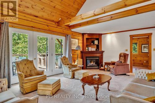 48 Sturgeon Glen Road, Kawartha Lakes (Fenelon Falls), ON - Indoor Photo Showing Living Room With Fireplace