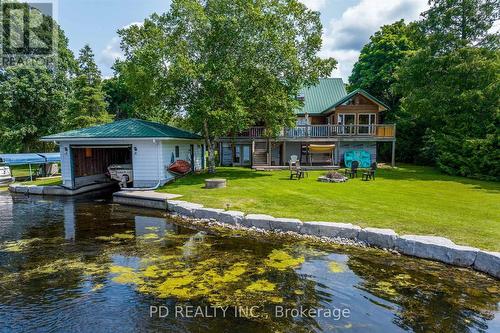 48 Sturgeon Glen Road, Kawartha Lakes (Fenelon Falls), ON - Outdoor With Body Of Water With Deck Patio Veranda