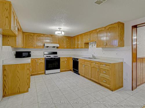 36 Ludgate Dr, Toronto, ON - Indoor Photo Showing Kitchen With Double Sink