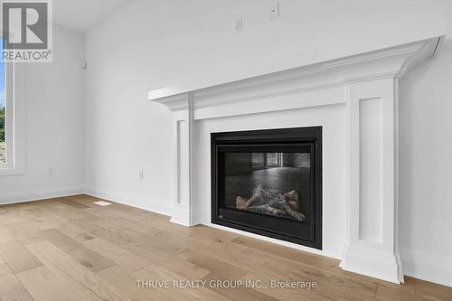 3958 Campbell Street N, London, ON - Indoor Photo Showing Living Room With Fireplace