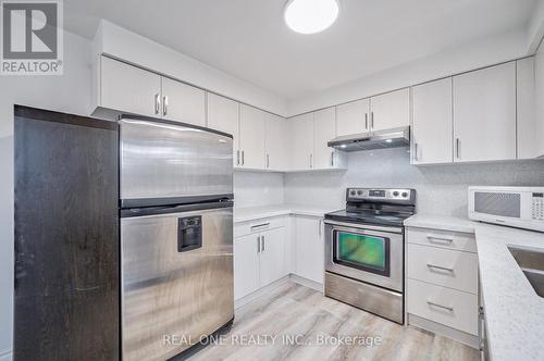 1449 Eddie Shain Drive, Oakville, ON - Indoor Photo Showing Kitchen With Stainless Steel Kitchen With Double Sink