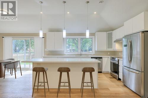 Virtually Staged - Interior Design Possibilities - 6765 James Street, London, ON - Indoor Photo Showing Kitchen With Upgraded Kitchen