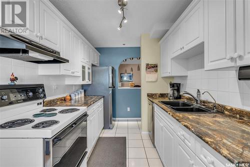 306 301 Cree Crescent, Saskatoon, SK - Indoor Photo Showing Kitchen With Double Sink