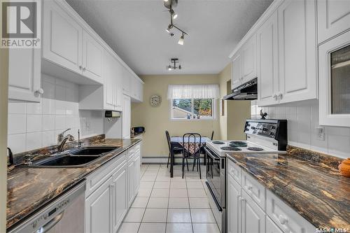 306 301 Cree Crescent, Saskatoon, SK - Indoor Photo Showing Kitchen With Double Sink