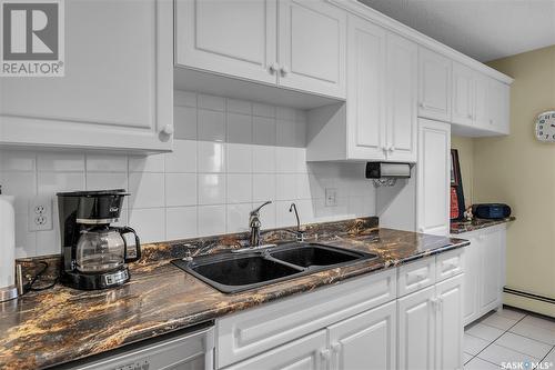 306 301 Cree Crescent, Saskatoon, SK - Indoor Photo Showing Kitchen With Double Sink