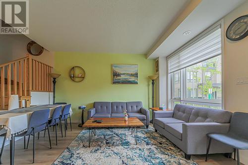 8 - 20 Woodstream Drive, Toronto, ON - Indoor Photo Showing Living Room