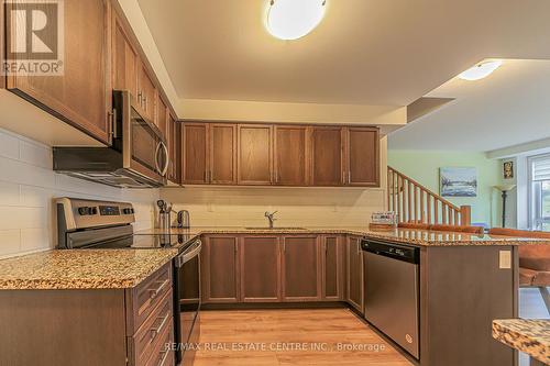 8 - 20 Woodstream Drive, Toronto, ON - Indoor Photo Showing Kitchen With Stainless Steel Kitchen