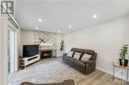 1010 Cahill Drive W, Ottawa, ON - Indoor Photo Showing Living Room With Fireplace