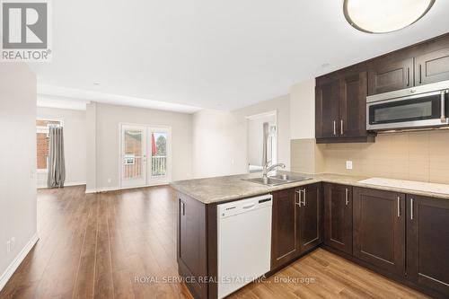 311 - 239 James Street E, Cobourg, ON - Indoor Photo Showing Kitchen With Double Sink