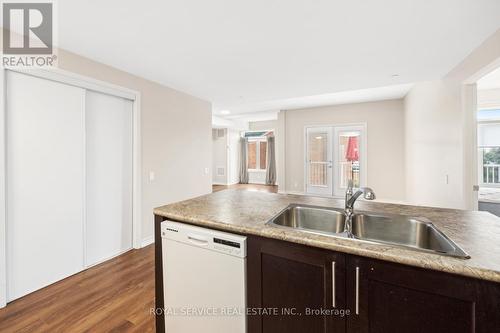 311 - 239 James Street E, Cobourg, ON - Indoor Photo Showing Kitchen With Double Sink