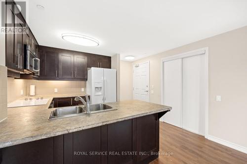 311 - 239 James Street E, Cobourg, ON - Indoor Photo Showing Kitchen With Double Sink