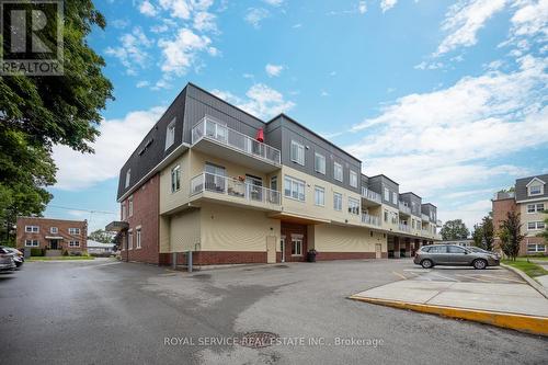 311 - 239 James Street E, Cobourg, ON - Outdoor With Balcony With Facade