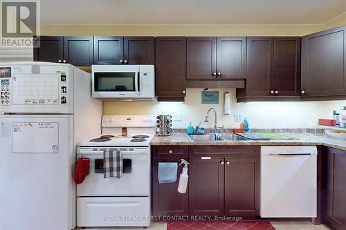 Duplex - 66 Parkside Drive, Barrie, ON - Indoor Photo Showing Kitchen With Double Sink