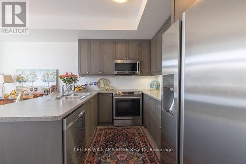 4173 Palermo Common S, Burlington, ON - Indoor Photo Showing Kitchen With Double Sink With Upgraded Kitchen